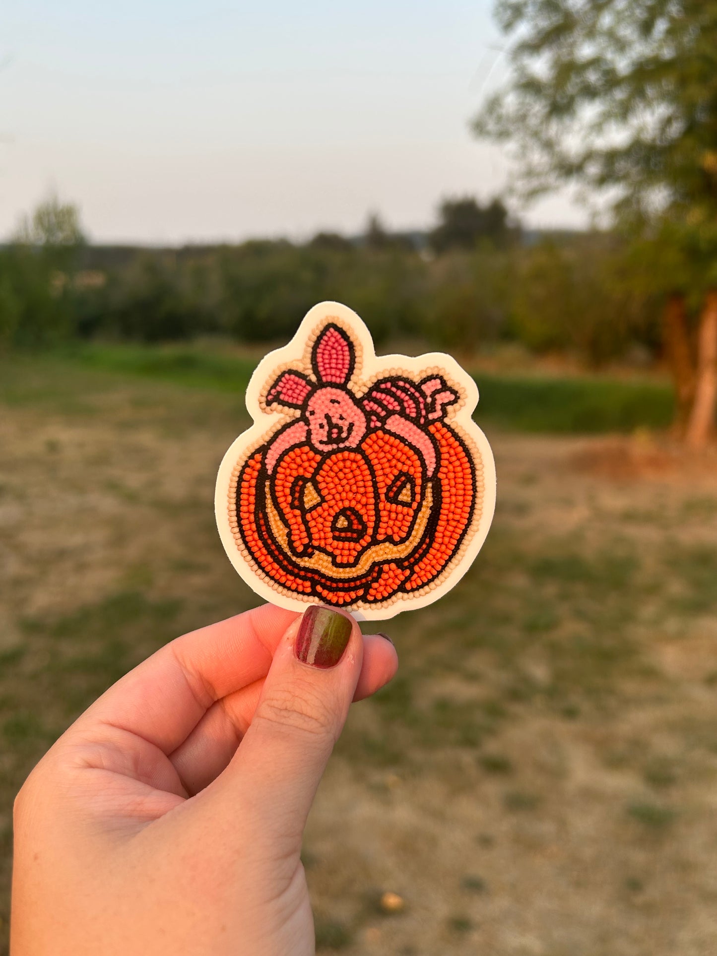 Piglet on a pumpkin