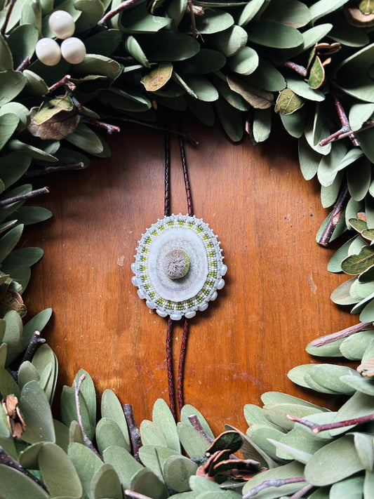 Tufted antler bolo tie